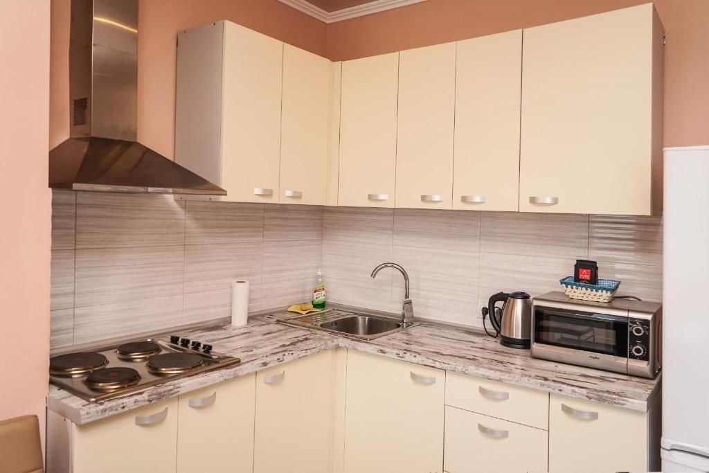 Апартаменты Cozy apartment in a new building close to the downtown Киев
