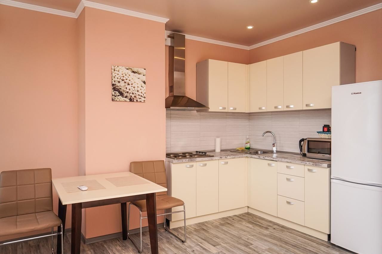 Апартаменты Cozy apartment in a new building close to the downtown Киев