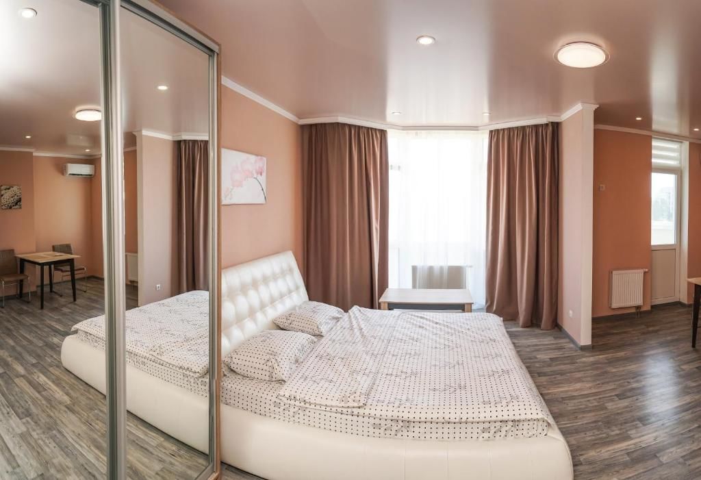 Апартаменты Cozy apartment in a new building close to the downtown Киев