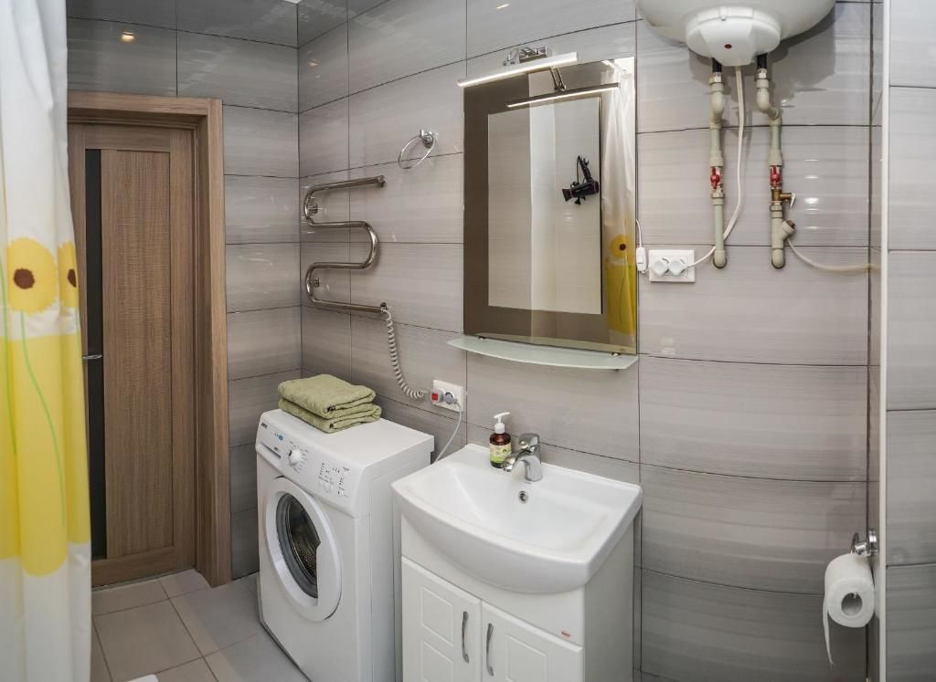 Апартаменты Cozy apartment in a new building close to the downtown Киев